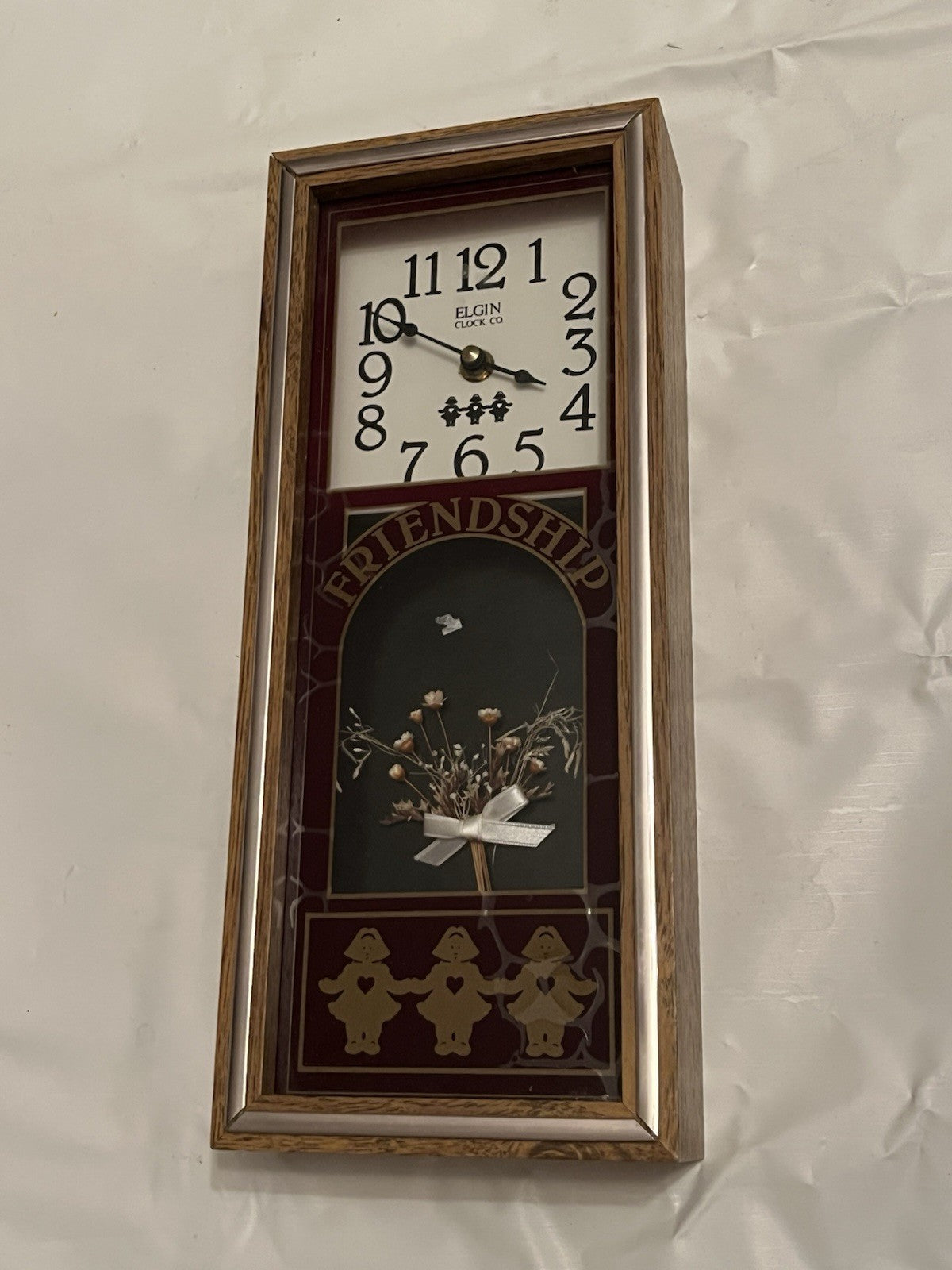 Elgin "Friendship" Shadow Box Wall Clock W/ Faux Flowers And Dutch Girl Details