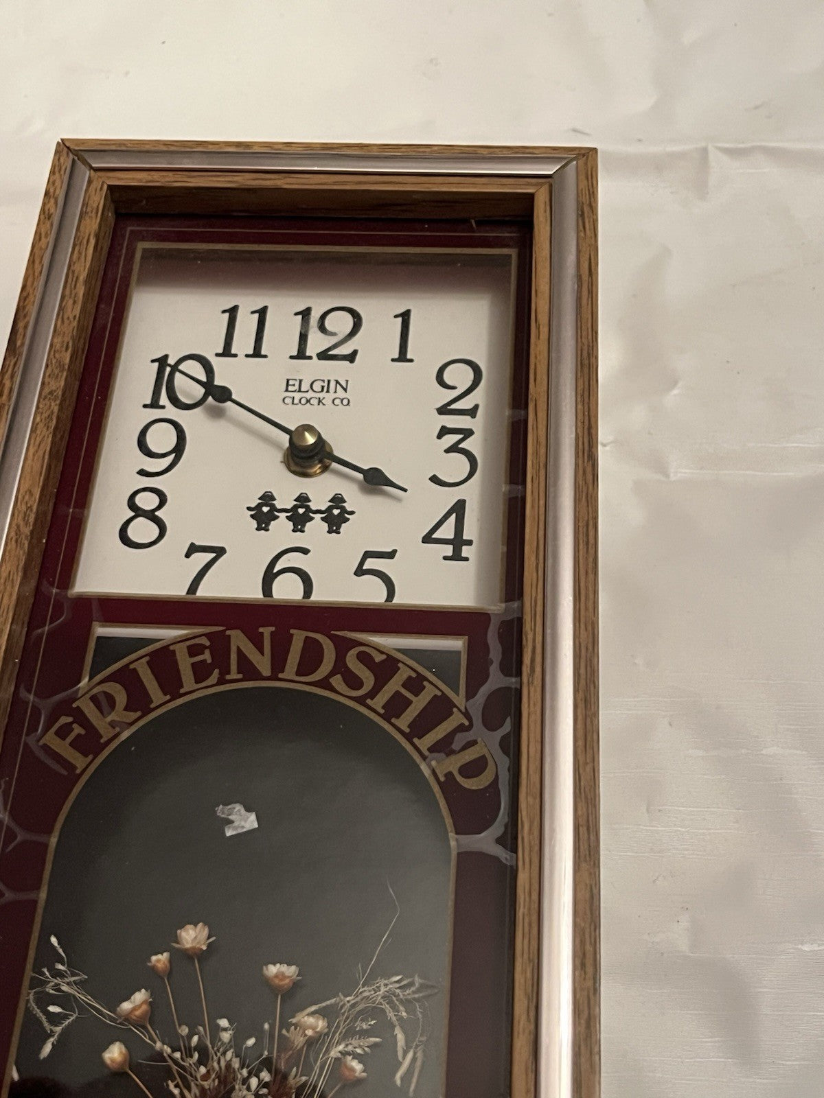 Elgin "Friendship" Shadow Box Wall Clock W/ Faux Flowers And Dutch Girl Details