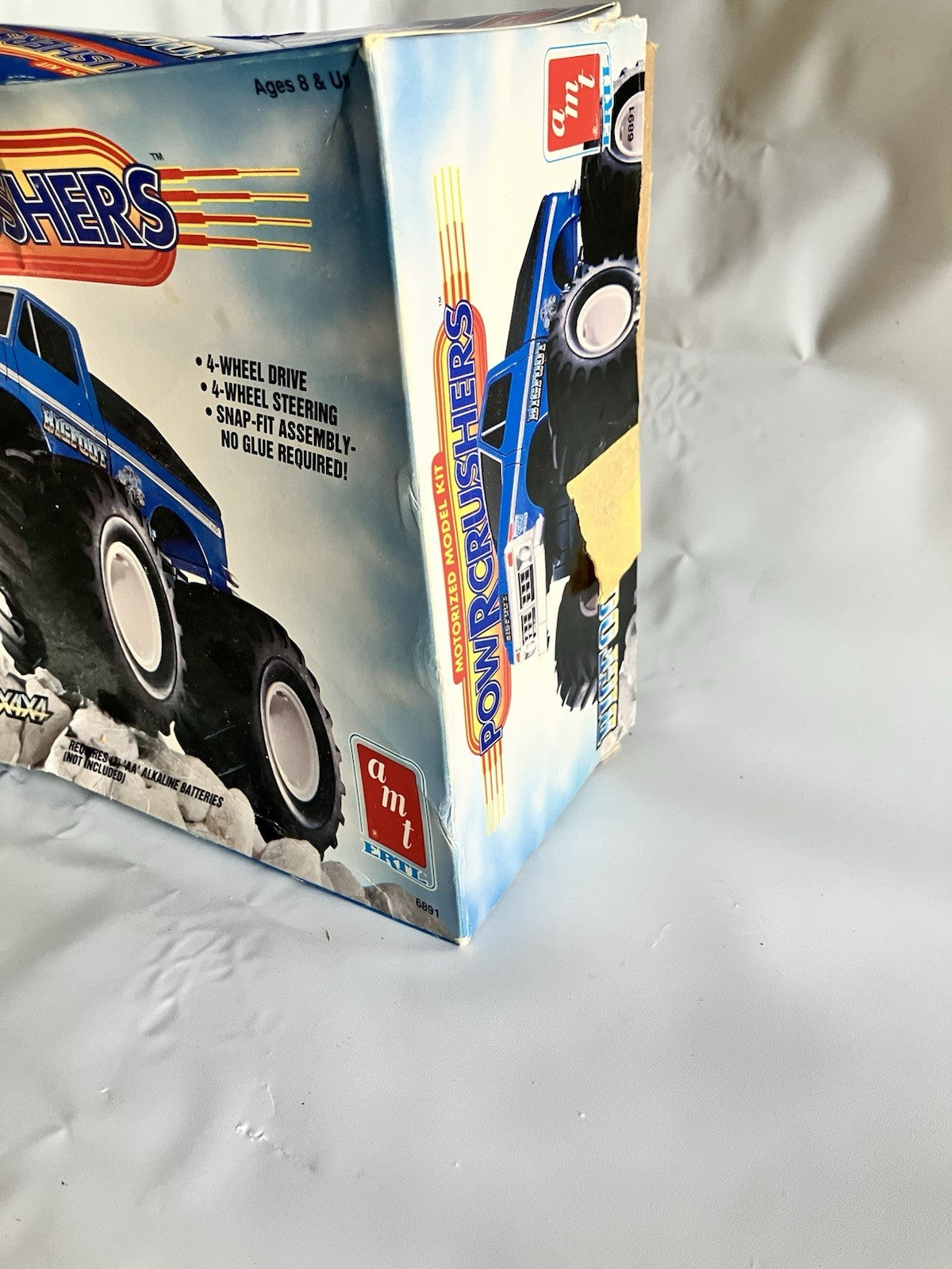 Bigfoot 4x4x4 Powrcrushers Motorized Monster Truck AMT model kit, 1989