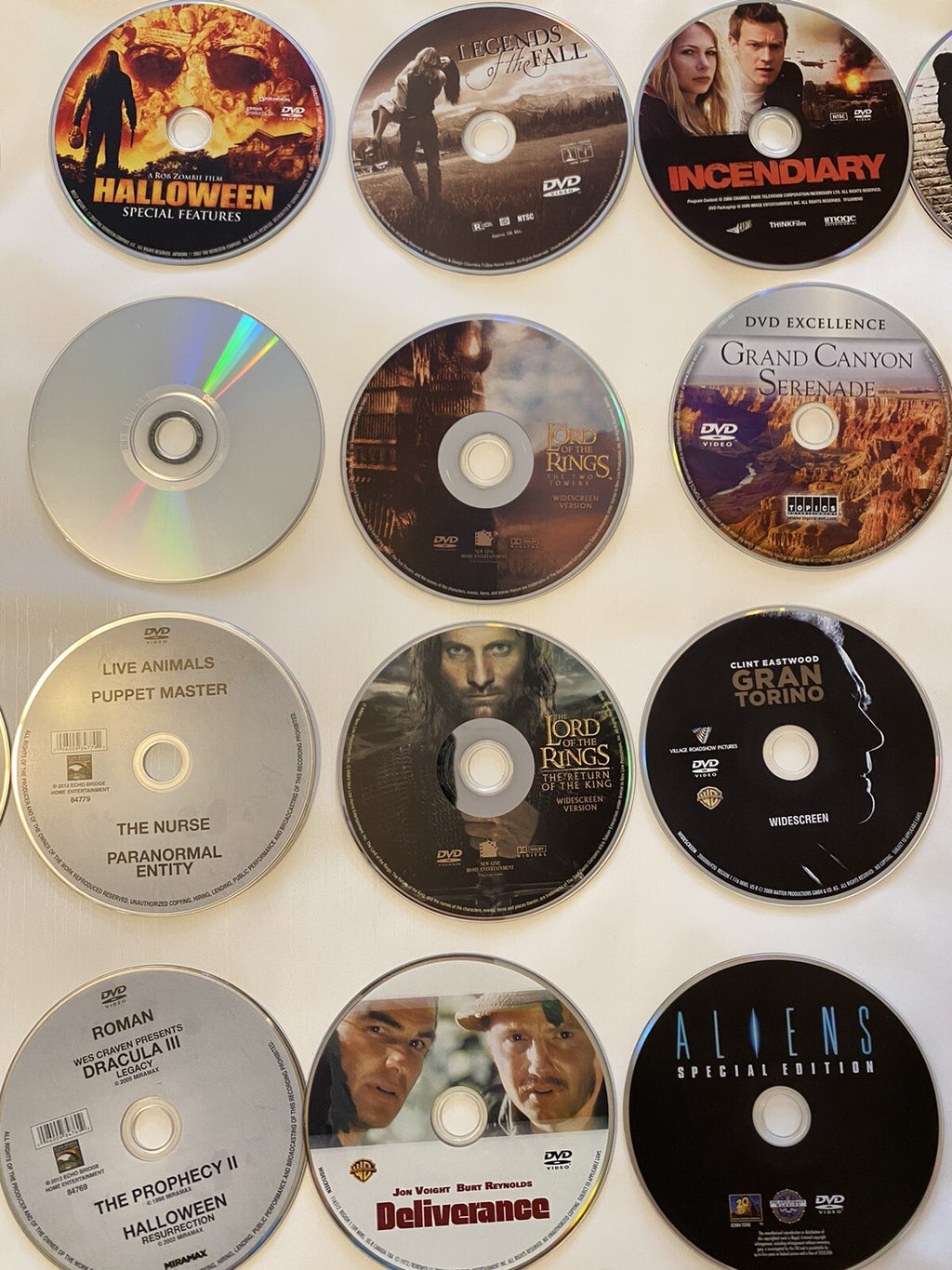 Lot of 49 DVDs Movies American Gangster/Open Range/Silence of the Lamb/Kiss The