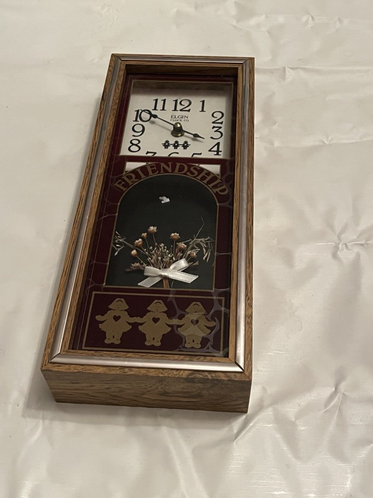 Elgin "Friendship" Shadow Box Wall Clock W/ Faux Flowers And Dutch Girl Details