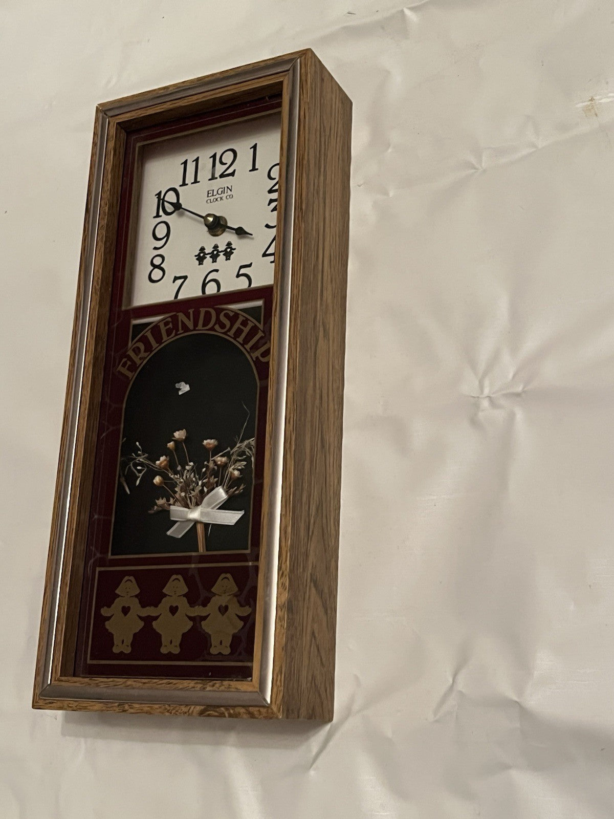 Elgin "Friendship" Shadow Box Wall Clock W/ Faux Flowers And Dutch Girl Details