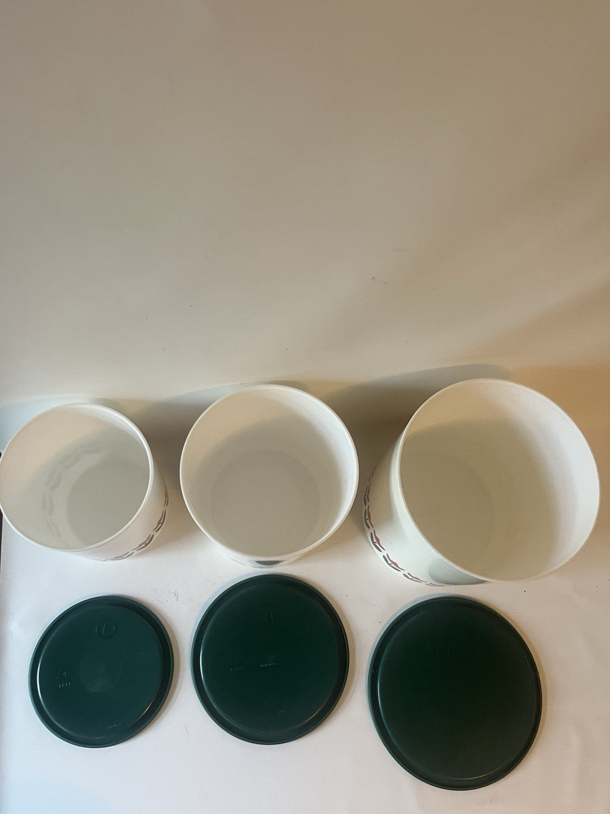 Vtg. One Touch White Tulip Tupperware Canisters with Green Lids; A-C; B/D sets