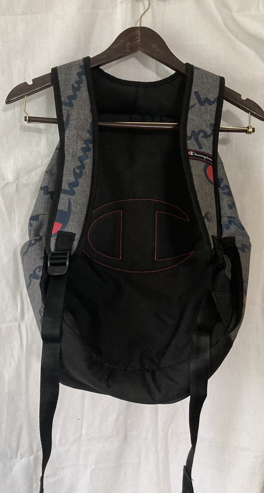Unisex Champion Grey Back Pack with Navy/Red Logo.