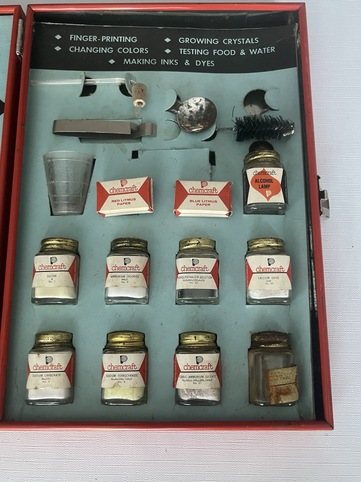 1950s Porters Chemcraft Home chemistry kit; original testing material, book.