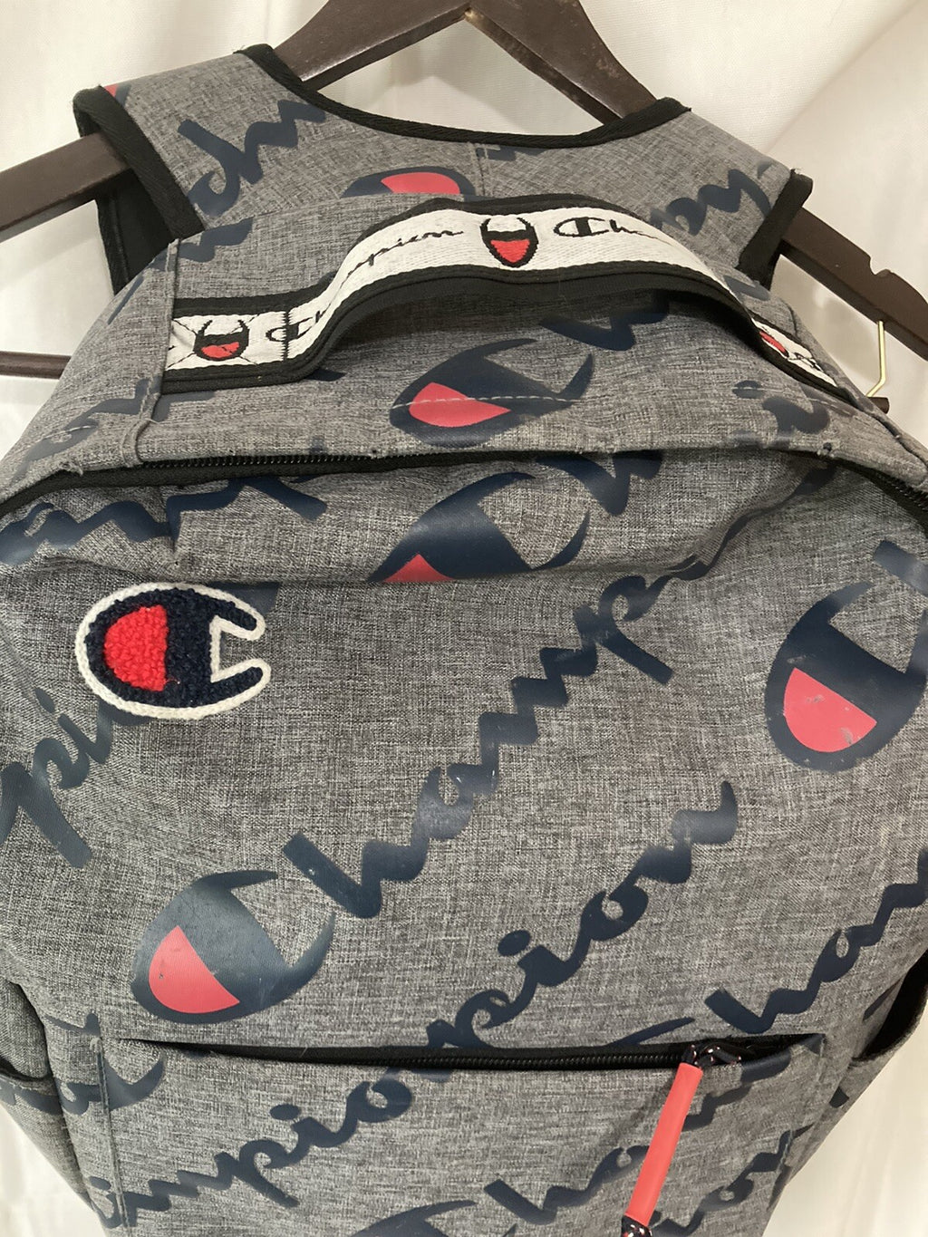Unisex Champion Grey Back Pack with Navy/Red Logo.