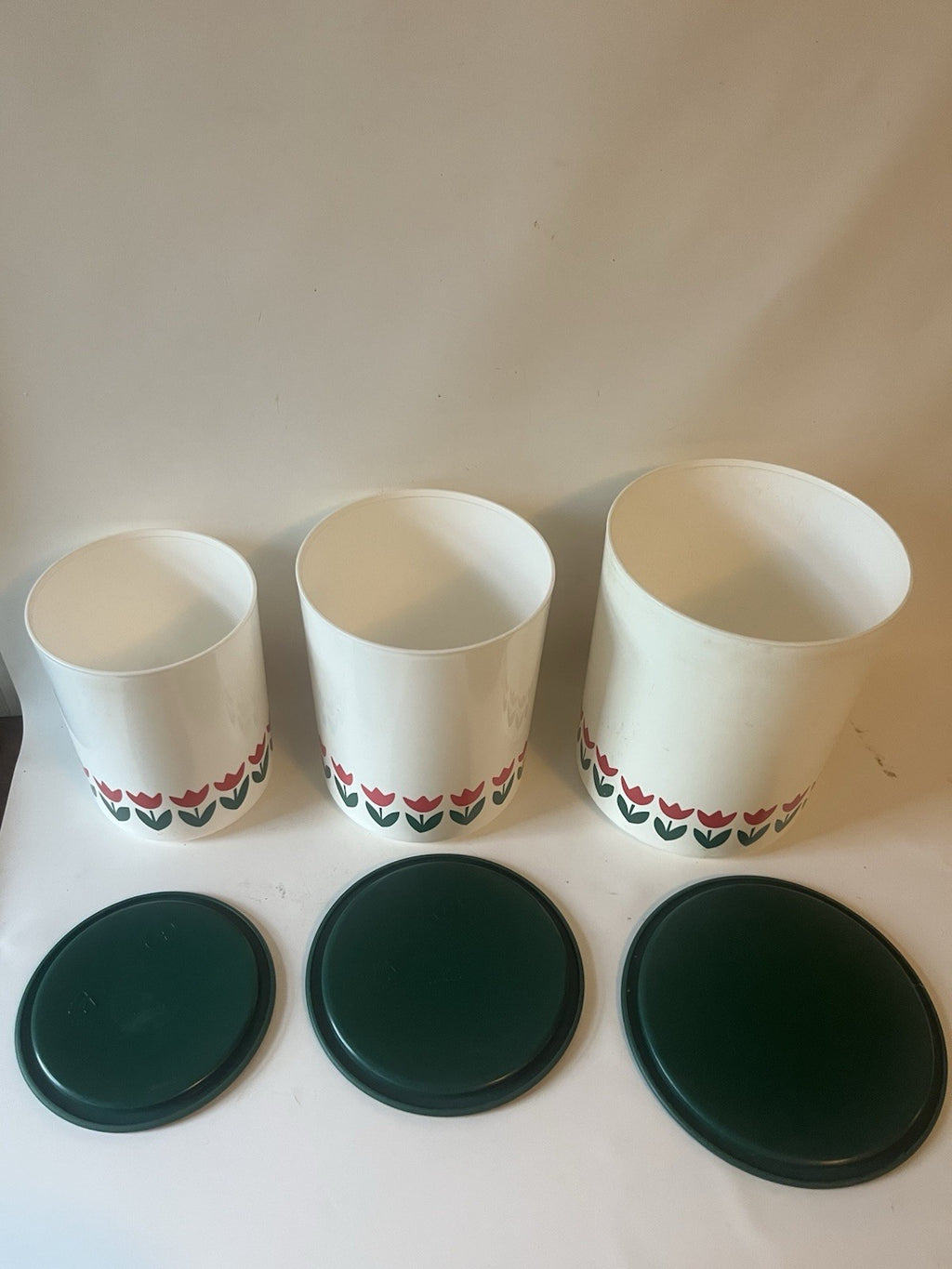 Vtg. One Touch White Tulip Tupperware Canisters with Green Lids; A-C; B/D sets
