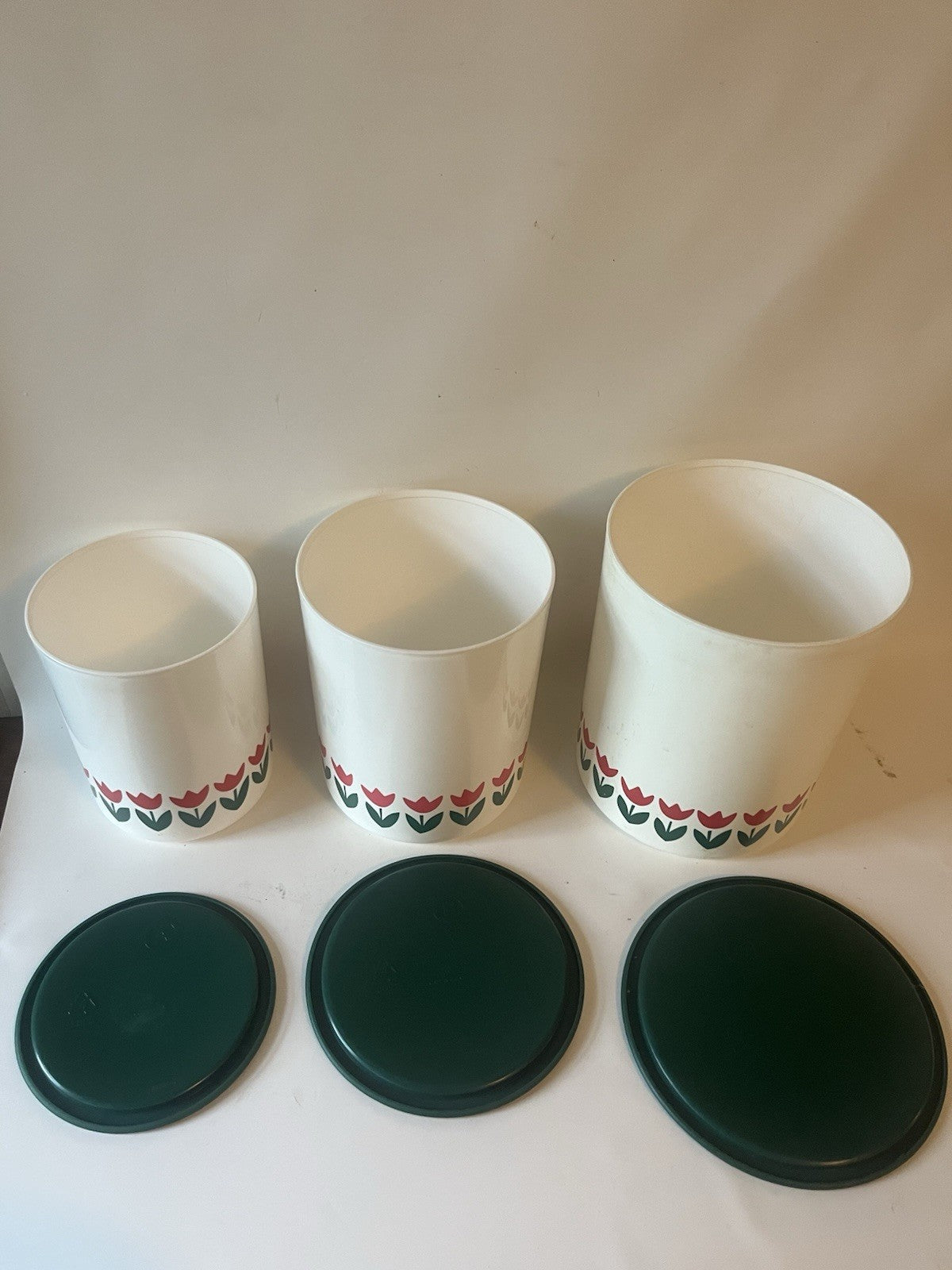 Vtg. One Touch White Tulip Tupperware Canisters with Green Lids; A-C; B/D sets