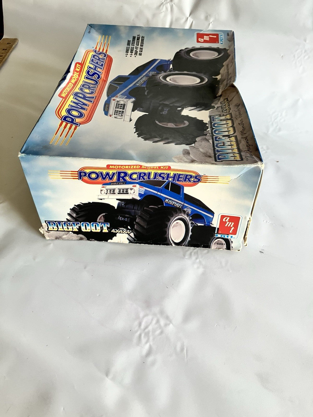 Bigfoot 4x4x4 Powrcrushers Motorized Monster Truck AMT model kit, 1989