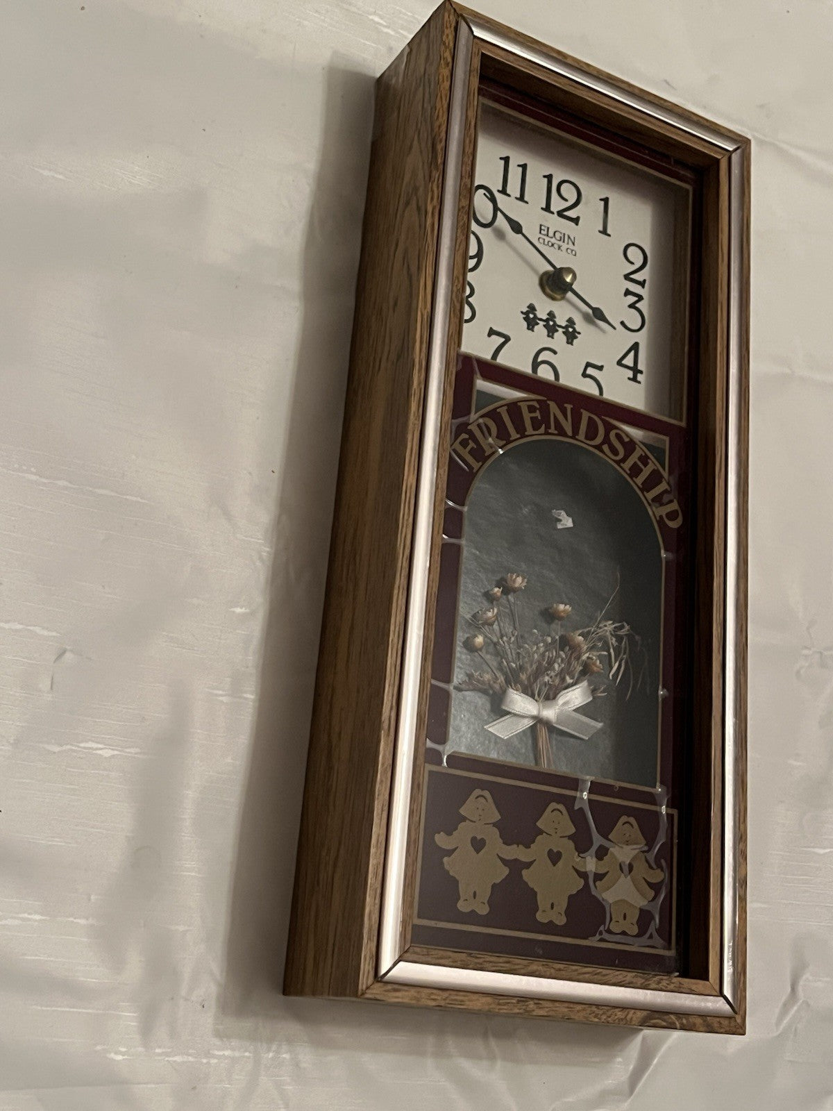 Elgin "Friendship" Shadow Box Wall Clock W/ Faux Flowers And Dutch Girl Details