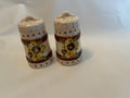 Vintage ceramic daisy shakers